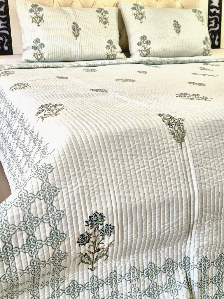 Powder Blue base with Floral Motifs - Hand Blocked Quilted Bedcover