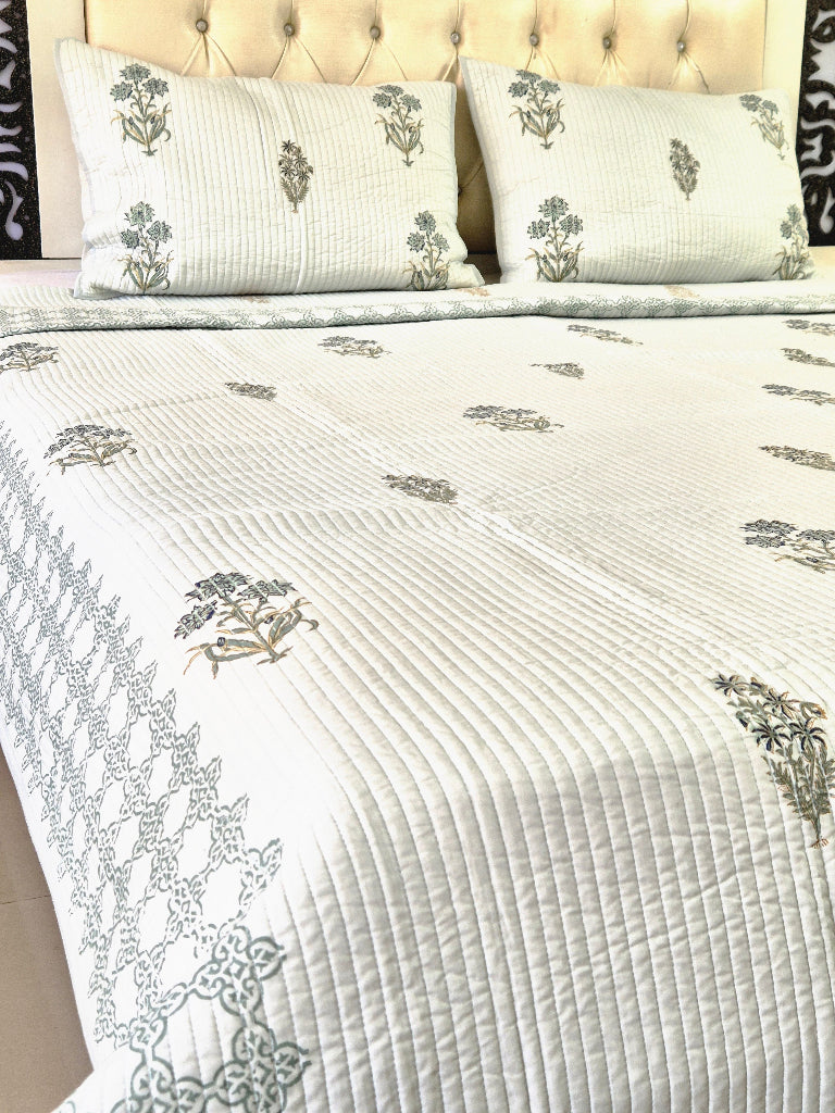 Powder Blue base with Floral Motifs - Hand Blocked Quilted Bedcover