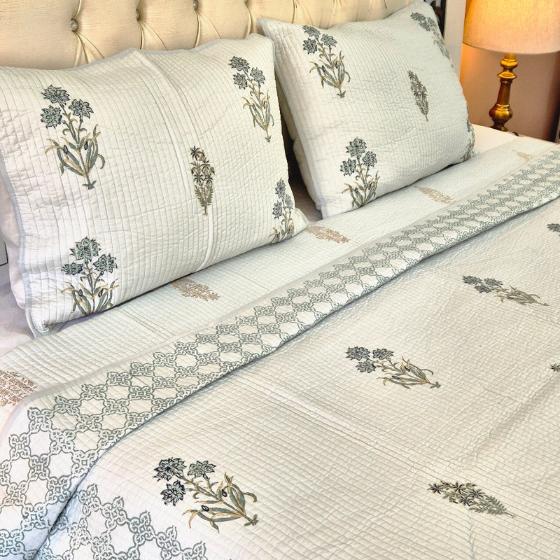 Powder Blue base with Floral Motifs - Hand Blocked Quilted Bedcover