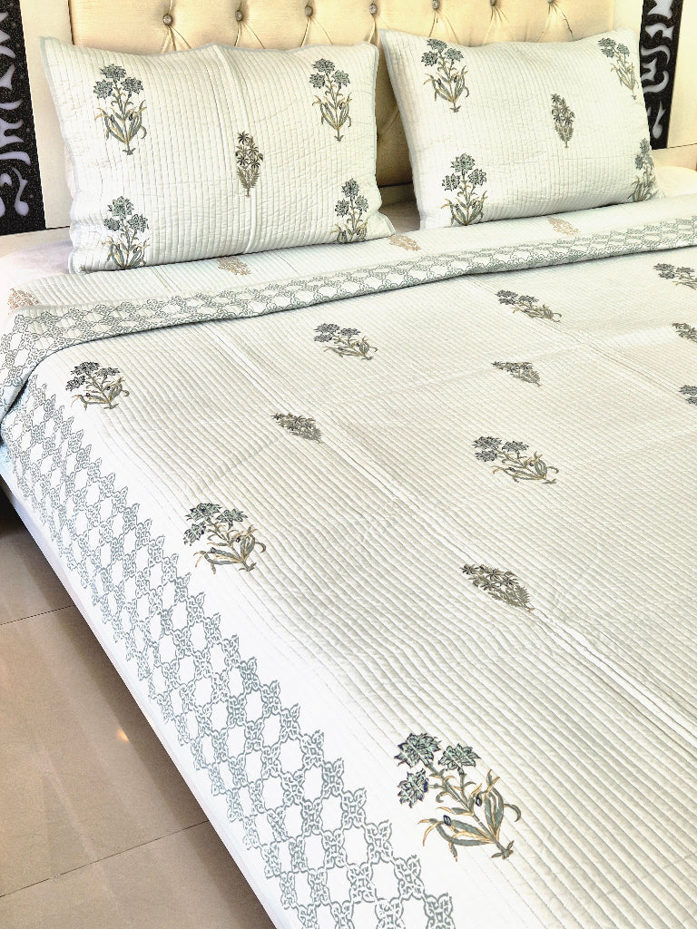 Powder Blue base with Floral Motifs - Hand Blocked Quilted Bedcover