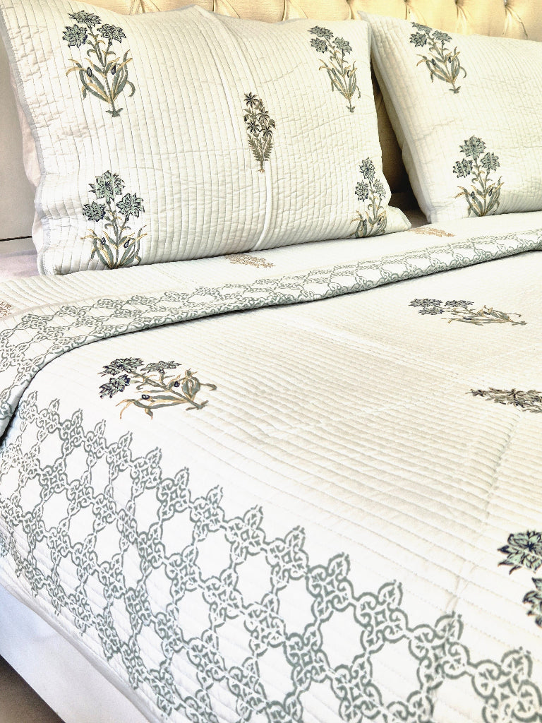 Powder Blue base with Floral Motifs - Hand Blocked Quilted Bedcover