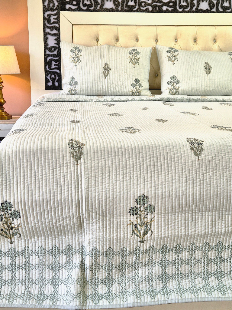 Powder Blue base with Floral Motifs - Hand Blocked Quilted Bedcover