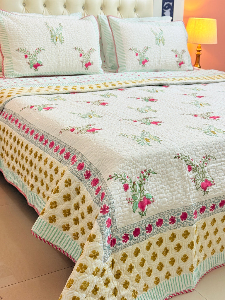 The Floral Bliss Hand Blocked Quilted Bedcover