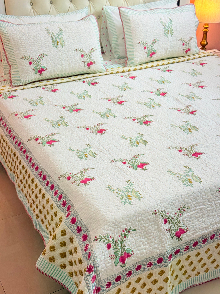 The Floral Bliss Hand Blocked Quilted Bedcover